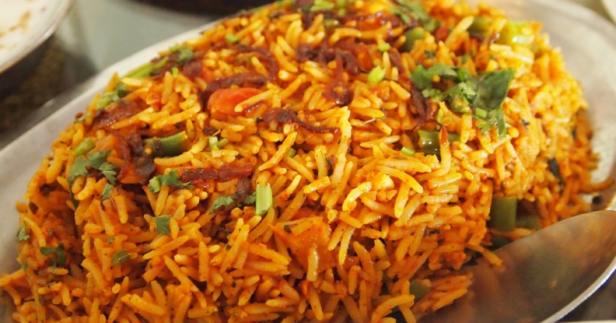 A plate of vegetable biryani, the kind of order a restaurant sends out through a delivery app